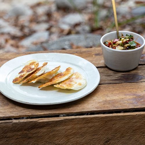 Potstickers mit Schlammkrabbe, Pilzen & Barramundi