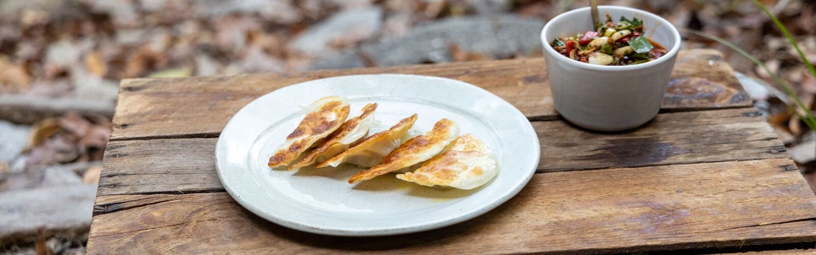 Potstickers mit Schlammkrabbe, Pilzen & Barramundi